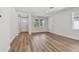 Living room with beautiful hardwood floors and views to the front entrance at 2729 36Th N Ave, St Petersburg, FL 33713