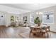 Open-concept living room with stylish furnishings, plenty of natural light, and hardwood floors at 2729 36Th N Ave, St Petersburg, FL 33713