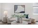 Cozy living room with stylish decor, including modern art and plush seating for relaxation at 2729 36Th N Ave, St Petersburg, FL 33713