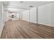 Spacious open-concept living room featuring hardwood floors leading into the kitchen area at 2729 36Th N Ave, St Petersburg, FL 33713