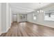 Spacious living room featuring wood-look floors, bright white walls, and recessed lighting at 2729 36Th N Ave, St Petersburg, FL 33713