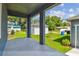 Covered patio featuring pillars and a view of the yard at 2729 36Th N Ave, St Petersburg, FL 33713