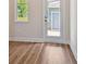 Interior room with wood floor, window and glass door at 2729 36Th N Ave, St Petersburg, FL 33713