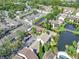 Aerial view of community with pool and lake at 3869 S Lake Dr # 146, Tampa, FL 33614
