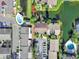 Aerial view of condo community with pools and lake at 3869 S Lake Dr # 146, Tampa, FL 33614