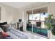 Private screened balcony with seating and tranquil view at 3869 S Lake Dr # 146, Tampa, FL 33614