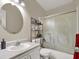 Clean bathroom with shower/tub combo and swan-design accents at 3869 S Lake Dr # 146, Tampa, FL 33614