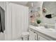 Clean bathroom with a shower/tub, vanity, and shelving at 3869 S Lake Dr # 146, Tampa, FL 33614