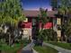 Condo building exterior with walkway and landscaping at 3869 S Lake Dr # 146, Tampa, FL 33614