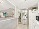 View of kitchen with white cabinets and breakfast bar at 3869 S Lake Dr # 146, Tampa, FL 33614