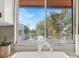Kitchen sink with a view of the parking lot and trees at 3869 S Lake Dr # 146, Tampa, FL 33614