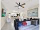 Open living room with sectional sofa and access to kitchen at 3869 S Lake Dr # 146, Tampa, FL 33614