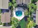 Community pool with surrounding landscaping at 3869 S Lake Dr # 146, Tampa, FL 33614