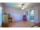 Spacious bedroom with hardwood floors and an ensuite bathroom at 8323 Monaco Dr # 0, Port Richey, FL 34668