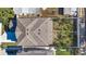 Aerial view of a house and backyard with a stone path at 1820 47Th N Ave, St Petersburg, FL 33714