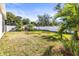 Large backyard with a grassy area and white fence at 1820 47Th N Ave, St Petersburg, FL 33714