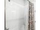 Bathroom with shower/tub combo and stylish shower curtain at 1820 47Th N Ave, St Petersburg, FL 33714