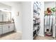 Modern bathroom with double vanity and walk-in closet at 1820 47Th N Ave, St Petersburg, FL 33714