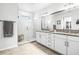 Elegant bathroom with granite double vanity and a large walk-in shower at 1820 47Th N Ave, St Petersburg, FL 33714