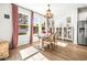 Charming dining area with a table for four and built in shelving at 1820 47Th N Ave, St Petersburg, FL 33714