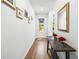 Light and airy entryway with hardwood floors and wall decor at 1820 47Th N Ave, St Petersburg, FL 33714