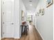 Bright entryway with hardwood floors and a console table at 1820 47Th N Ave, St Petersburg, FL 33714