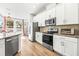 Kitchen with stainless steel appliances and granite countertops at 1820 47Th N Ave, St Petersburg, FL 33714