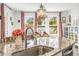 Kitchen island with granite countertop and stainless steel sink at 1820 47Th N Ave, St Petersburg, FL 33714