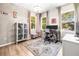 Home office with large windows, chandelier, and plenty of storage at 1820 47Th N Ave, St Petersburg, FL 33714