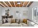 Living area with French doors opening to a patio and hardwood floors at 2027 Inner S Cir, St Petersburg, FL 33712