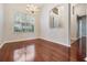 Formal dining room with hardwood floors and chandelier at 2619 Abbey Grove Dr, Valrico, FL 33594