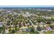 Scenic aerial view showcasing the expansive neighborhood filled with green trees, roadways and commercial buildings at 2735 36Th N Ave, St Petersburg, FL 33713