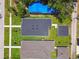 An aerial view of the home showing its roof, yard, and surrounding neighborhood at 2735 36Th N Ave, St Petersburg, FL 33713