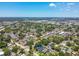 Scenic aerial view showcasing the expansive neighborhood filled with green trees, roadways and commercial buildings at 2735 36Th N Ave, St Petersburg, FL 33713