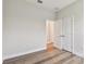 Bedroom featuring wood floors, neutral paint, and a double closet at 2735 36Th N Ave, St Petersburg, FL 33713