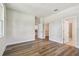 Bright bedroom featuring hardwood floors, a walk-in closet, and ensuite bath at 2735 36Th N Ave, St Petersburg, FL 33713