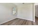 This bedroom has beautiful wood floors, natural light, and neutral paint at 2735 36Th N Ave, St Petersburg, FL 33713