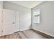 Bedroom featuring a window, closet, light paint, and wood floors at 2735 36Th N Ave, St Petersburg, FL 33713