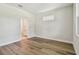 Bright bedroom featuring hardwood floors and ensuite bath at 2735 36Th N Ave, St Petersburg, FL 33713