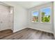 A light-filled entryway with wood floors leads to the front door and bedrooms at 2735 36Th N Ave, St Petersburg, FL 33713