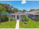 Charming single-story home with a well-manicured lawn and tidy landscaping at 2735 36Th N Ave, St Petersburg, FL 33713