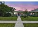 Charming single-story home with a well-manicured lawn and tidy landscaping at 2735 36Th N Ave, St Petersburg, FL 33713
