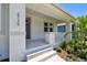 The exterior features a welcoming porch, perfect for enjoying the neighborhood views at 2735 36Th N Ave, St Petersburg, FL 33713