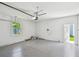 A view of the interior of the garage with epoxy flooring at 2735 36Th N Ave, St Petersburg, FL 33713