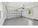 A view of the interior of the garage with epoxy flooring at 2735 36Th N Ave, St Petersburg, FL 33713