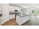 A beautifully designed kitchen with white cabinets and gray countertops is great for cooking at 2735 36Th N Ave, St Petersburg, FL 33713