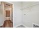 A laundry room featuring tile flooring, white walls, a shelf, and laundry hookups at 2735 36Th N Ave, St Petersburg, FL 33713