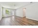 This light-filled living room has beautiful wood floors and neutral paint at 2735 36Th N Ave, St Petersburg, FL 33713