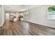 Inviting living area leads to a kitchen with a central island and stainless appliances at 2735 36Th N Ave, St Petersburg, FL 33713