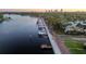 Waterfront homes at sunset with city skyline at 2800 Coffee Pot Ne Blvd, St Petersburg, FL 33704